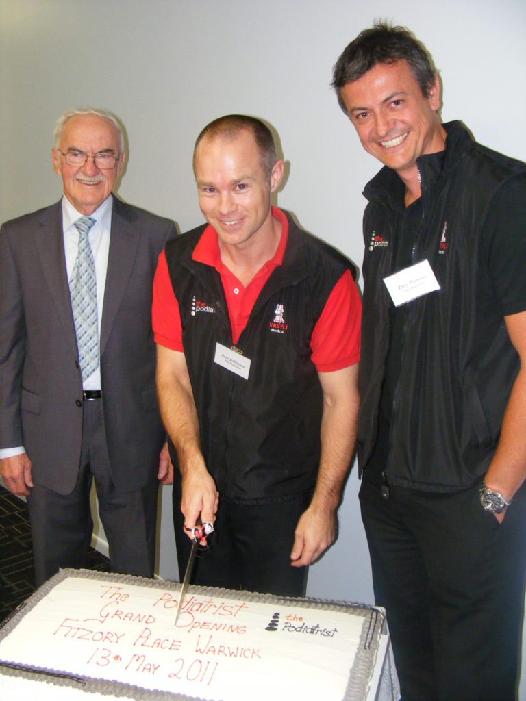 Mayor Ron Bellingham, Sam Johnston and Troy Parsons cutting the cakePhoto Lisa Hemmings / Warwick Daily News